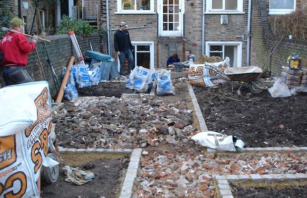 Creating the pathways with cobbled edging - Carol Whitehead garden design