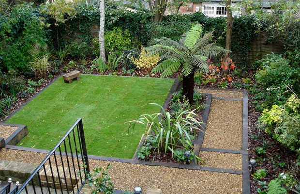 shade-loving plants and geometric garden layout on a former sloping garden - Carol Whitehead garden design